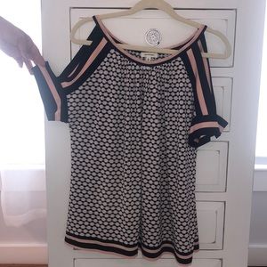 Women’s blouse with shoulder cut out